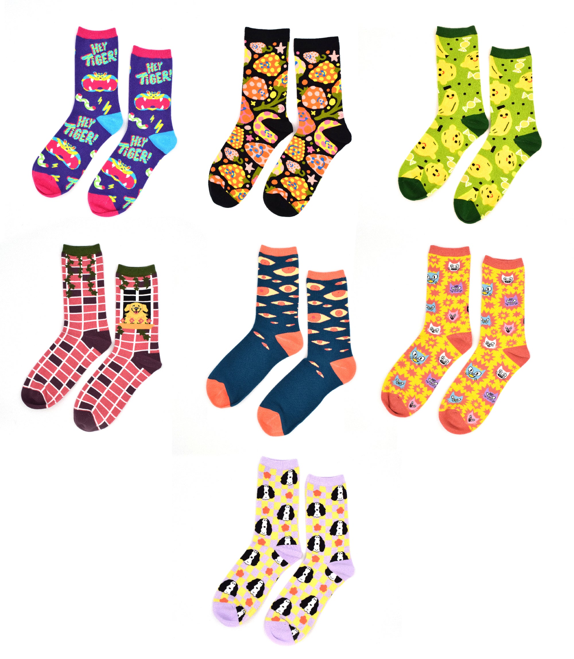 A grid of seven different pairs of previous Awesome Socks Club designs. 